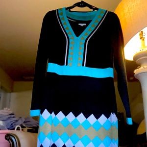 Dress Details:
V-Neck
Long Sleeves
Angora Look Alike
Soft